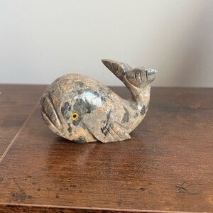 carved whale rock decoration